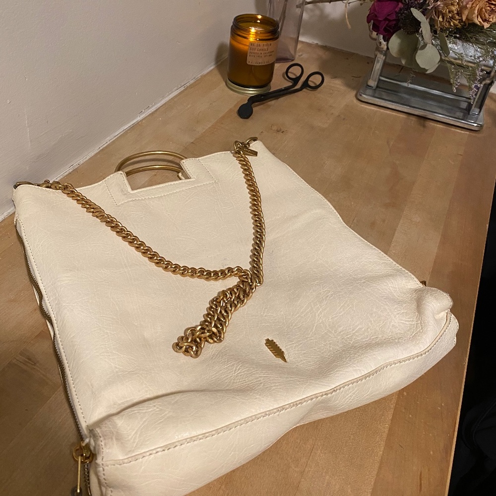 Thacker white and gold bag